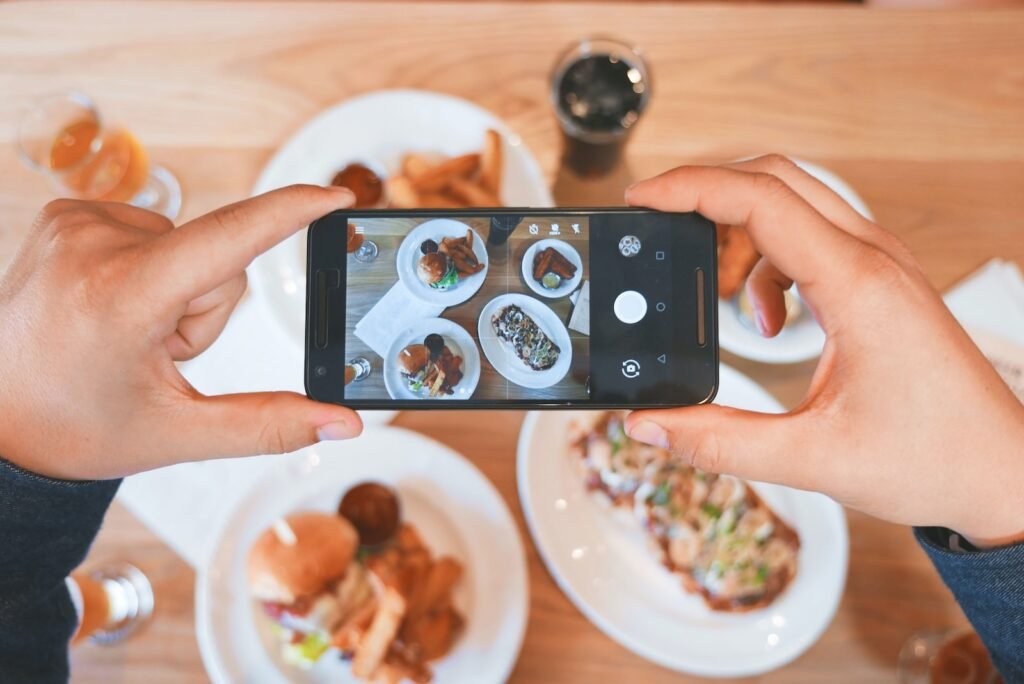 Video marketing, person taking picture of the foods